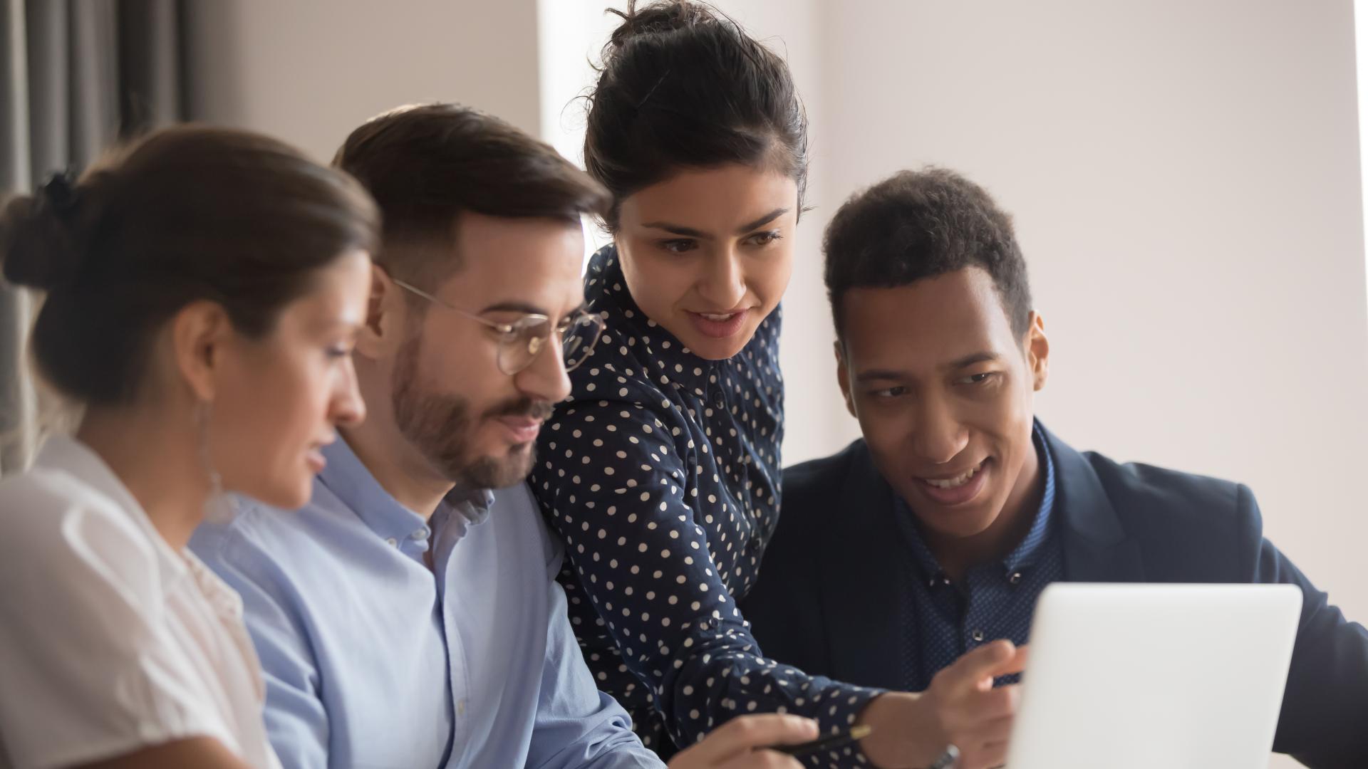 Group working around a computer