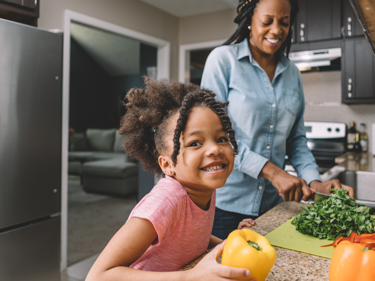 Child and Mother Cooking